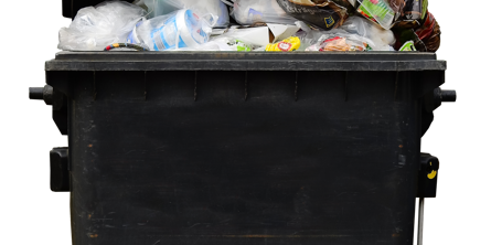 Stor sort, overfyldt affaldscontainer